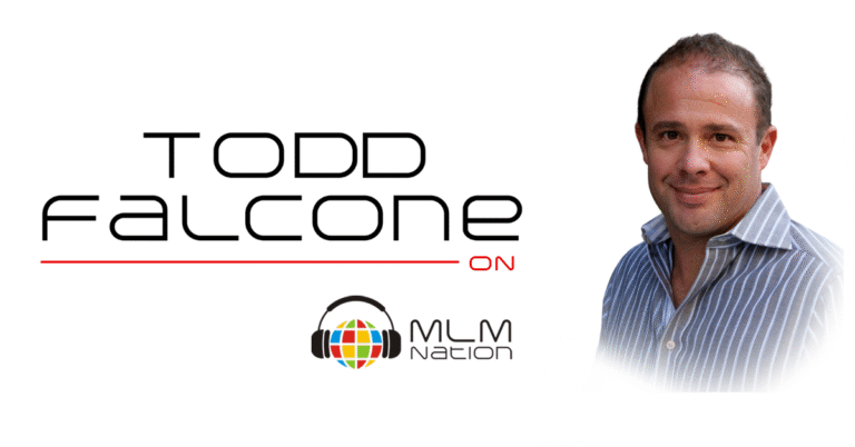 Todd Falcone smiling in front of microphone on MLM Nation Podcast