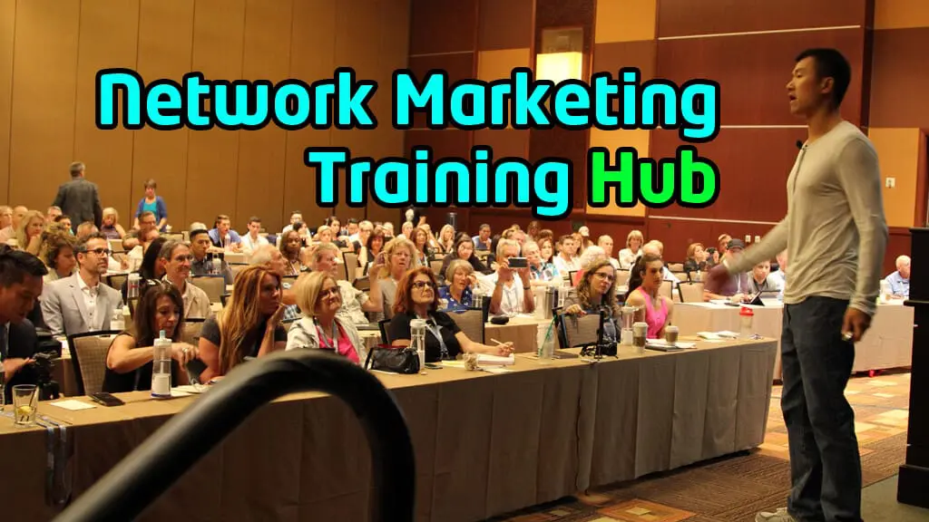 Simon Chan speaking at a network marketing training event